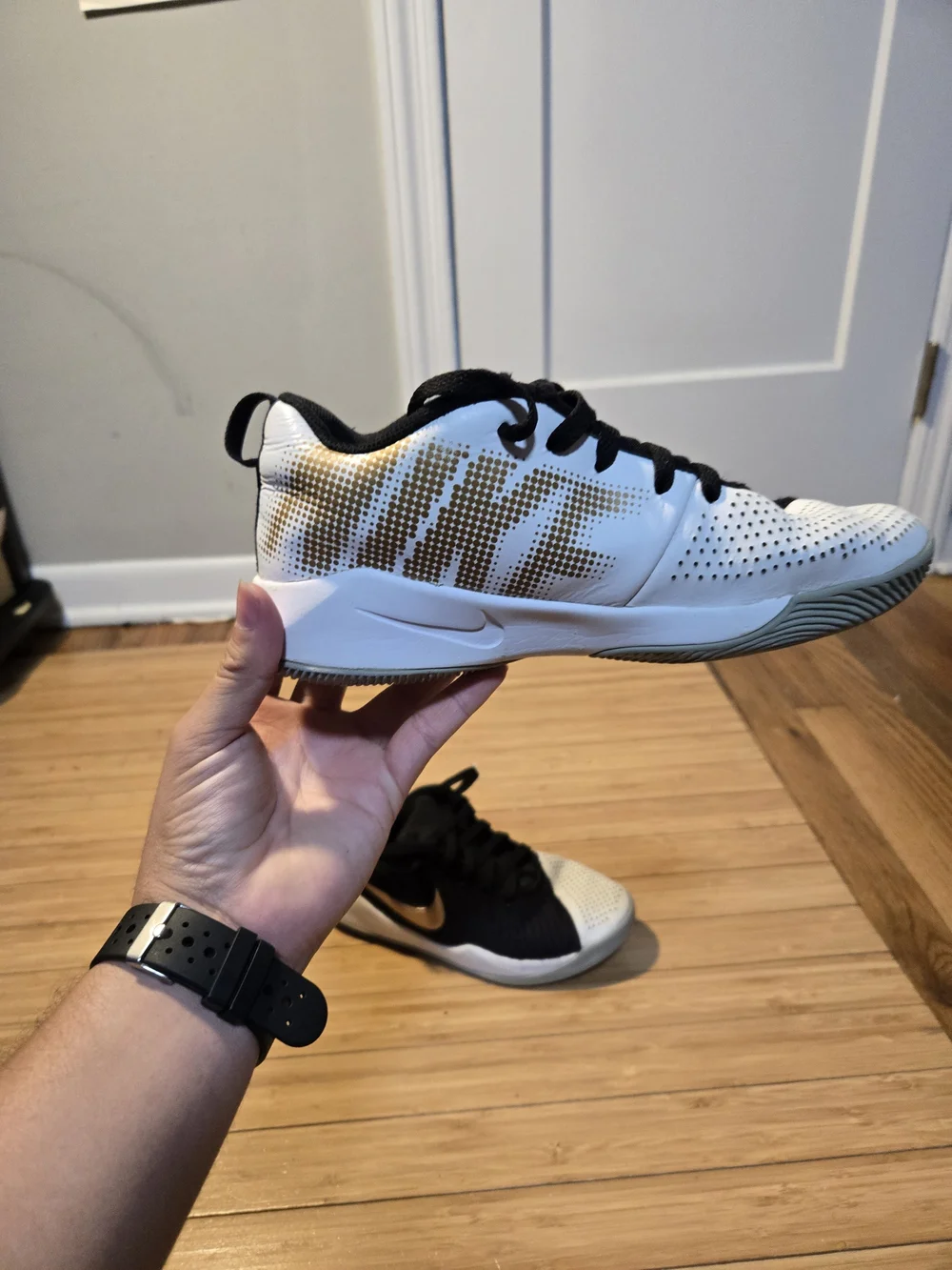 Nike Boy Black and White Basketball Shoes with Gold Accents